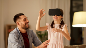 réalité virtuelle à la maison entre une fille et son père